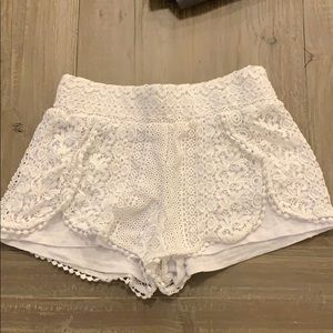 White shorts with lace overlay